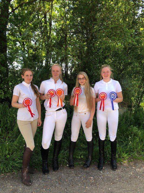 equine team ride to victory at regional competition