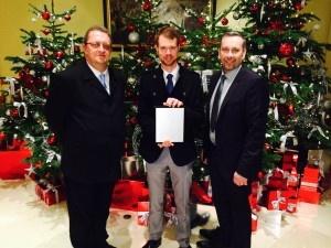 CGM Receiving Award L to R - Ian Burton Operations Manager, Adam Chown, Tim Glover Managing Director
